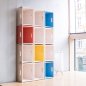 Preview: Werkbox Regalwand aus bunten und weißen Werkboxen
