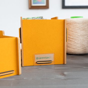 Sortierbox mit Schild