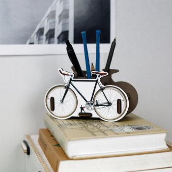 Stiftebox Fahrrad Speed Bike auf Büchern