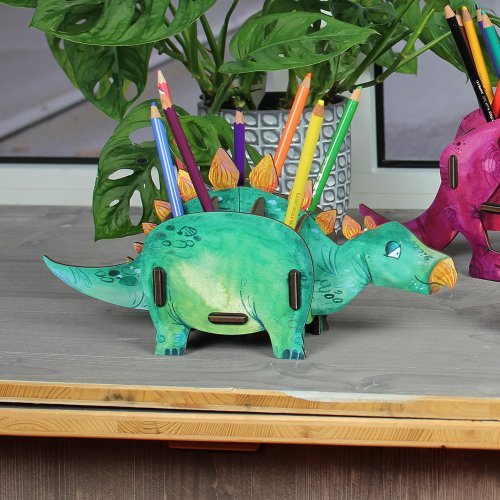Dino Stiftebox auf dem Tisch